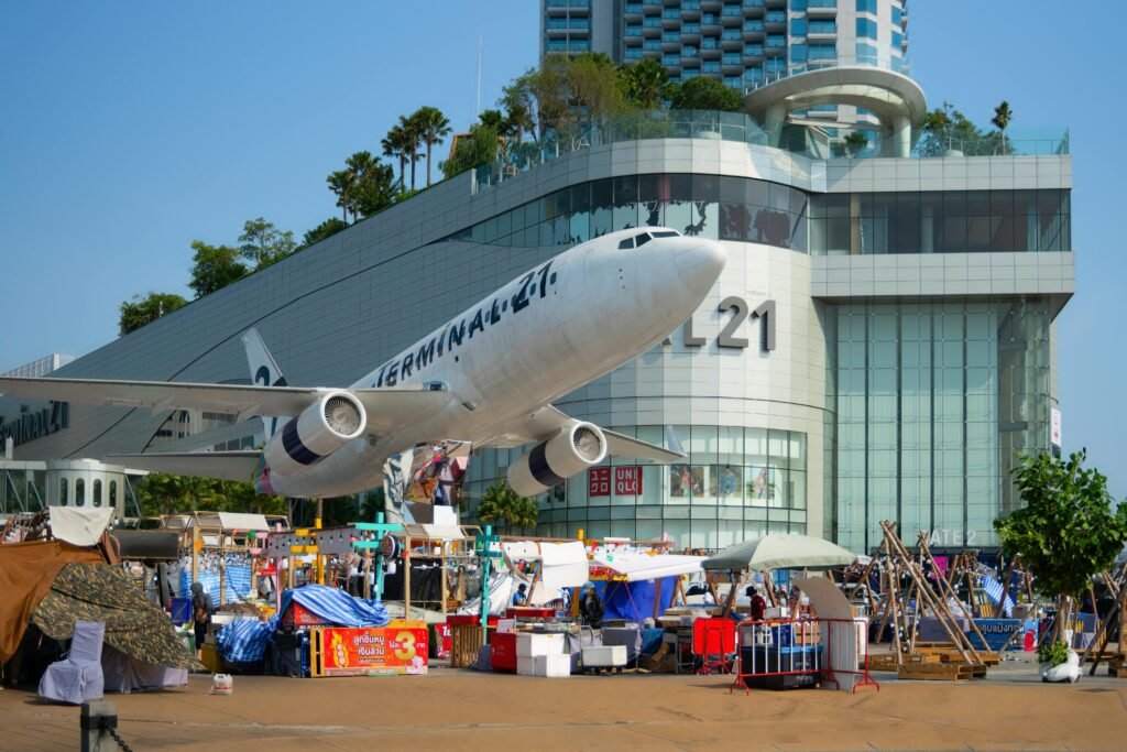 Exterior view of Terminal 21 Shopping Mall with airplane facade in Pattaya, Thailand.